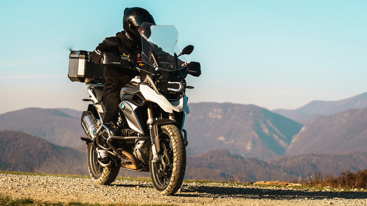 Adventure motorcycle on a gravel mountain road